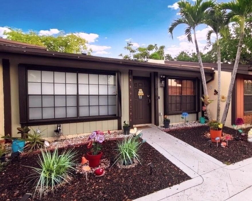 Welcome to Paradise. Beautifully updated 2-bedroom, 2-bath home in the sought-after Cedarwoods community of Pembroke Pines. This home features an open layout, a cozy loft space perfect for a home office, guest area, or creative retreat, & walk-in closets in both bedrooms. Enjoy a modern kitchen with custom-built cabinets, full backsplash, & all-new 2023 appliances, along with updated bathrooms, flooring, lighting. The main bathroom boasts a renovated walk-in shower, quartz vanity, & vessel sink, while the guest bathroom includes a quartzite vanity. French doors, epoxy flooring in the kitchen & dining area, a pergola in the backyard, & vaulted ceilings that create a bright, open, & airy atmosphere. 2 parking spaces in front of unit. Low HOA of $124/mo. Accordion shutters throughout.