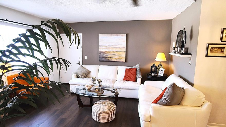 Beautiful bright & airy 2-bed, 1.5-bath corner condo & truly feels like home the moment you walk in. Brand new roof, brand new A/C, & recently updated floors baths & kitchen. Furniture can be included. One of the most unique listings available. This 2nd floor sunlit gem is filled w/natural light & charm, features wood floors, modern kitchen S/S appliances & designer baths w/ thoughtful touches. Step inside & appreciate the warmth & style. Located in the heart of Pompano Beach, minutes to pristine beaches, vibrant new fishing pier, oceanfront dining, boutique shopping, I-95 & endless outdoor fun—from water taxis to family-friendly parks & fitness trails. It feels like you're on vacation every day w/ resort-style amenities: sparkling pool, clubhouse, shuffleboard & lively community events.