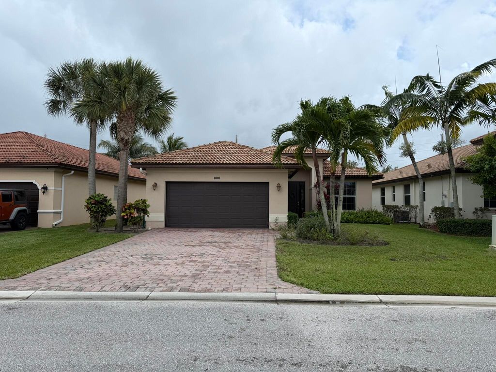 Photo of 7250 Prudencia Drive, Lake Worth, FL 33463 (MLS # B26010356)