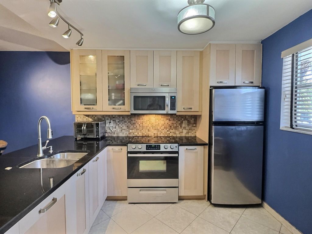 Photo of 3150 Holiday Springs Boulevard #8-204, Margate, FL 33063 (MLS # B26023591)