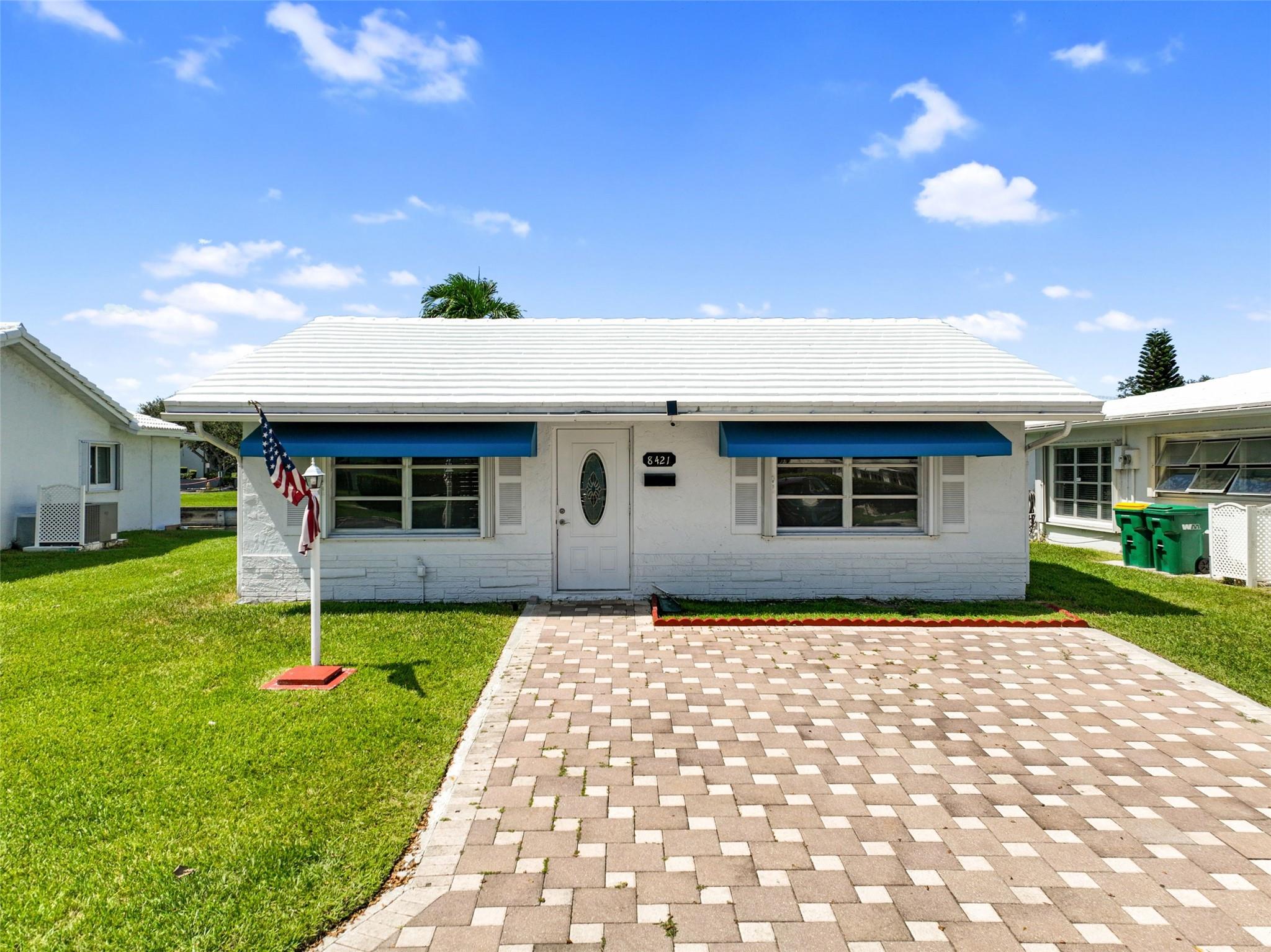 Just Listed! Beautifully remodeled single-family home in the highly desirable Mainlands of Tamarac Lakes, a well-known 55+ senior community. This spacious home offers 3 bedrooms and 2 bathrooms, with a serene backyard overlooking the lake—perfect for relaxation. Enjoy peace of mind with a low HOA fee that includes exterior house painting and roof maintenance. The sprinkler system is maintained by the Association. This quiet, well-kept neighborhood offers an unbeatable location close to restaurants, banks, shopping centers, major highways, and more. One person over 55+ must live in the house. Please note: Public records reflect the property as a 2 bed 1 bath. All information provided is deemed reliable but is not guaranteed and should be independently verified.