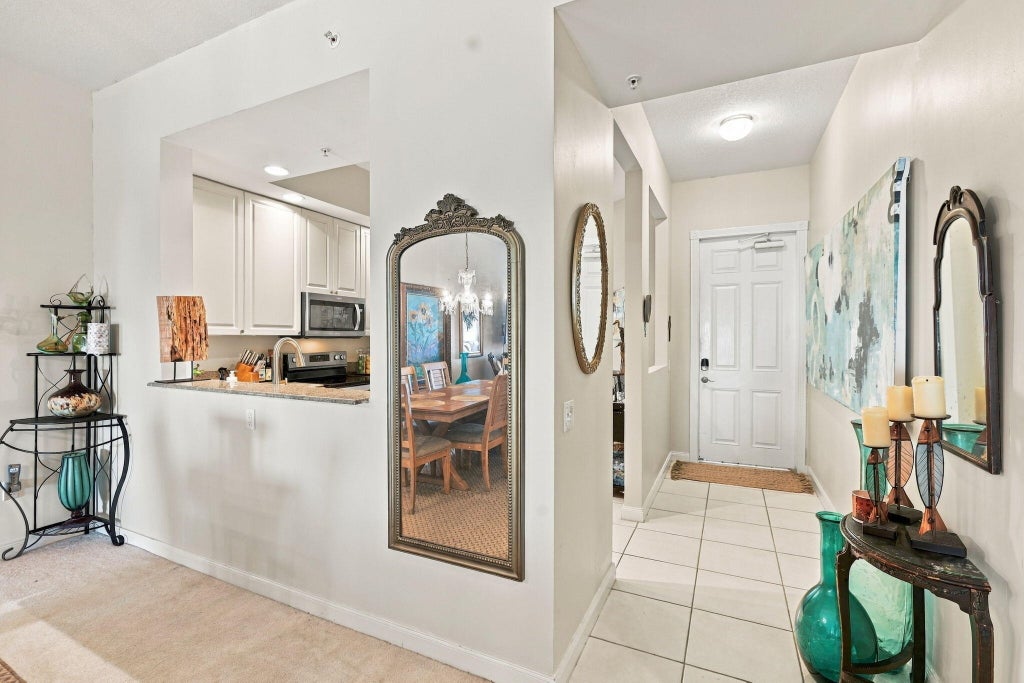Photo of 36 HARBOUR ISLE Drive W #303, Fort Pierce, FL 34949 (MLS # B26080084)