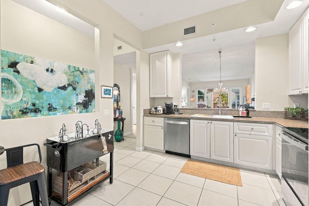 Photo of 36 HARBOUR ISLE Drive W #303, Fort Pierce, FL 34949 (MLS # B26080084)