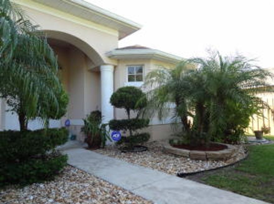 BUYERS THIS IS YOUR CHANCE FOR A GREAT DEAL!! OWNER DROPPED PRICE FOR QUICK SALE.  This beautiful 3/3/2 landscaped home is ready to move in. Room for a Pool, and already has a cabana bath. Home is located close to 95 and Tradition. Offers a large open floor plan, tile throughout main areas. Huge master Bdr. and master bath including sport shower, his /her sinks, and large tub. Kitchen is beautiful with granite tops, 42'' cabinets w/crown molding, and pantry. 2nd bath also has dual sinks, and tub w/shower. Exterior of home also has gutters around entire house, large screen room, and plenty of fruit trees. COME SEE THIS HOME TODAY, EASY ACCESS.