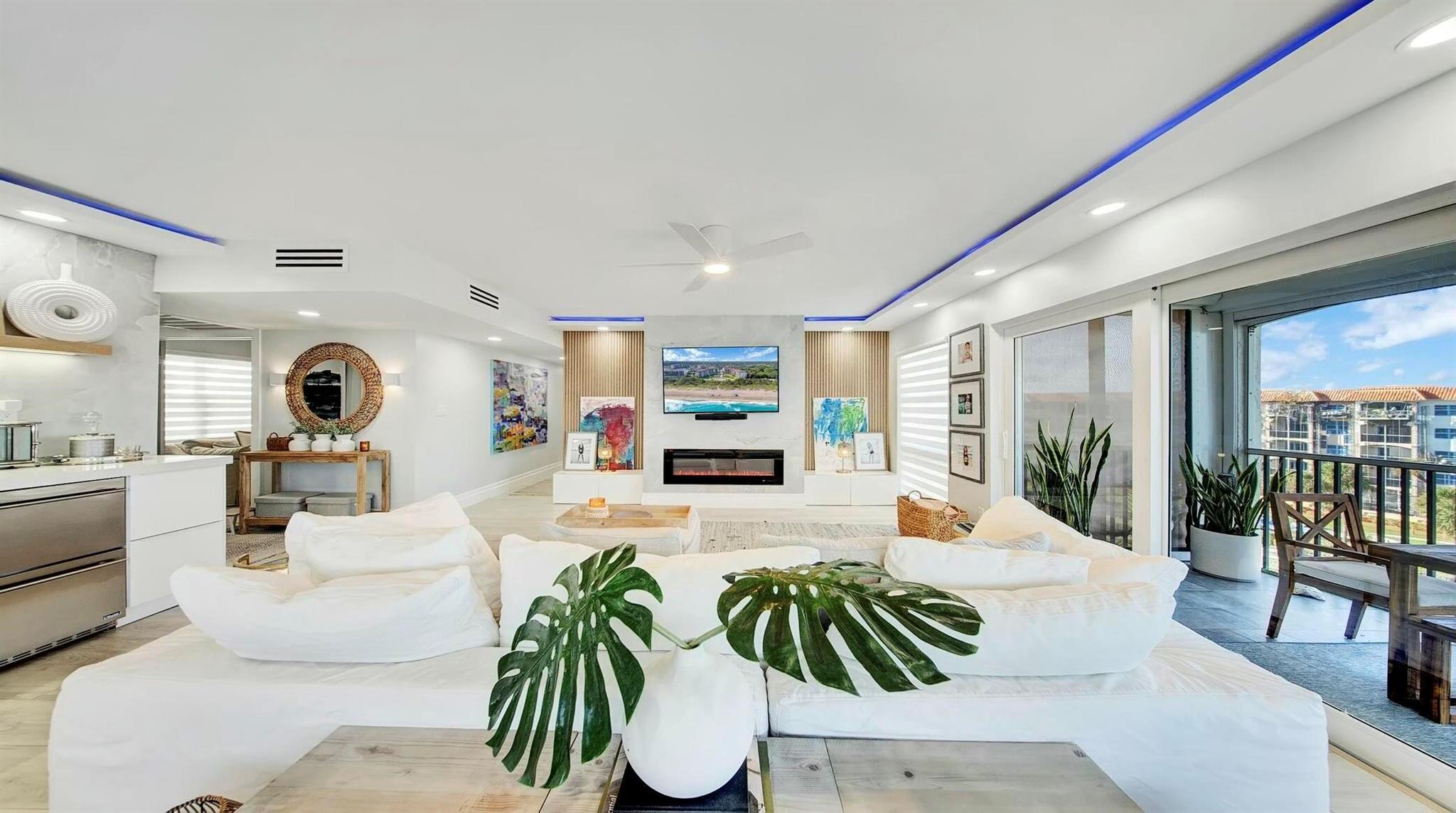 Live the Dream: Oceanfront Luxury in San Remo - A Rare Opportunity Step into your own private oasis, where coastal elegance meets modern sophistication! This rarely available, completely renovated 3-bedroom, 2.5-bath condo in the highly sought-after San Remo community is the home you've been waiting for. Perched on the edge of the Atlantic, this residence offers spectacular, sweeping ocean views from every room, all framed by expansive impact-glass windows that bathe the space in natural light. From the moment you enter, you'll be captivated by the serene ambiance and custom design details. A perfect balance of cottage-like charm and high-end luxury finishes throughout. The spacious, open-concept living area features bespoke cabinetry, stunning quartz countertops
