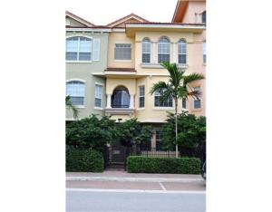 Beautiful townhome, 2 bedrooms plus a den, 3 1/2 baths, gated community, lake view in very desirable Harbour Oaks. Brand new carpet and paint. Close proximity to Gardens Mall, shopping, dining, and beaches.