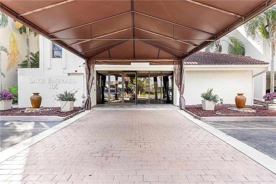 Large (bigger than most 2 bedrm units in complex), very clean,updated unit in secure bldg with beautiful views south over 168 acre lake. Tile floors throughout. Bright open kitchen w/SS appliances,W/D,newer AC & very recently installed impact sliding doors (open from either end) & windows. Separate living & dining areas. Premium covered parking spot. Resort style,centrally located community with 3 pools & hot tubs,sauna,gym,basketball,tennis/pickleball,library  along with various weekly clubhouse activities.Boating,kayaking,wind surfing etc all allowed on lake. EZ access to main rds & hwys and all just 10/15 mins from Beaches,Las Olas,Wilton Dr & Airport. X1 cable with DVR service + internet included in hoa fee.Pet friendly complex.Buyer must have 680+ credit.Leasing allowed after 1 year.