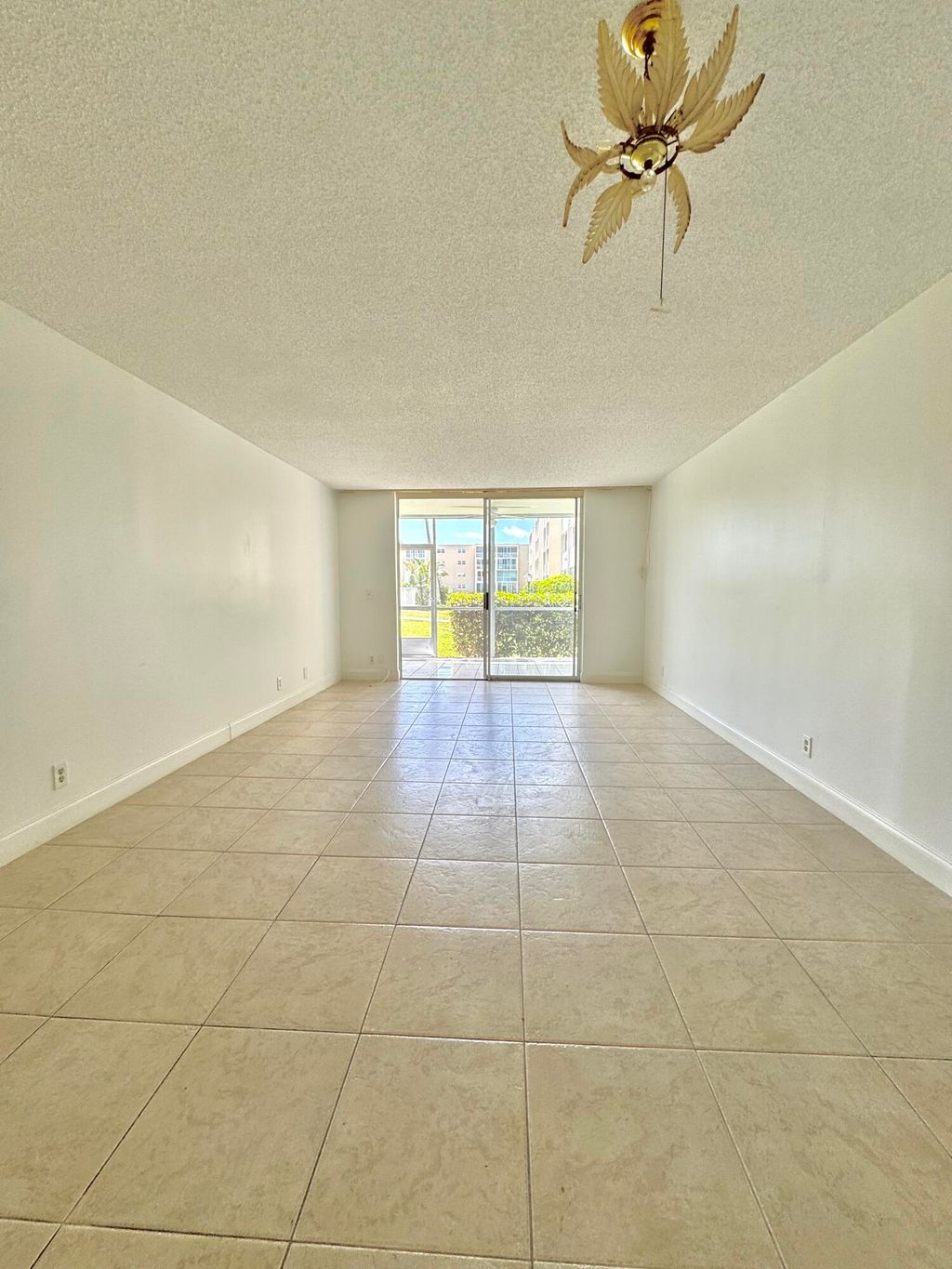 Photo of 202 SE 10th Street #105, Dania Beach, FL 33004 (MLS # B26014997)