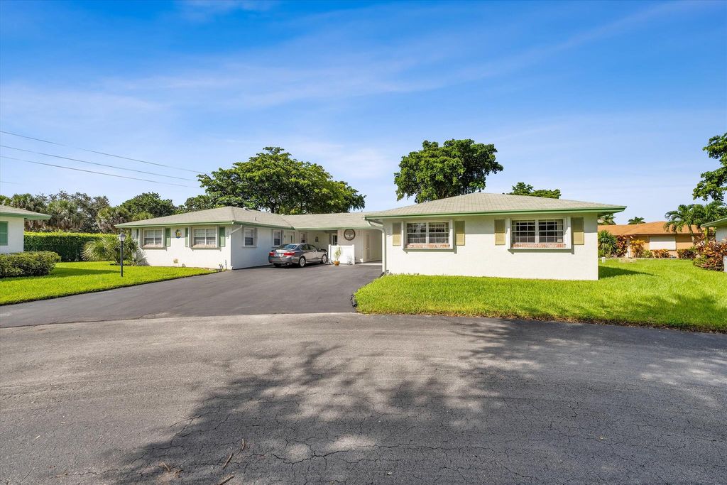 Photo of 824 Meadowlark Lane, Delray Beach, FL 33445 (MLS # R11024812)