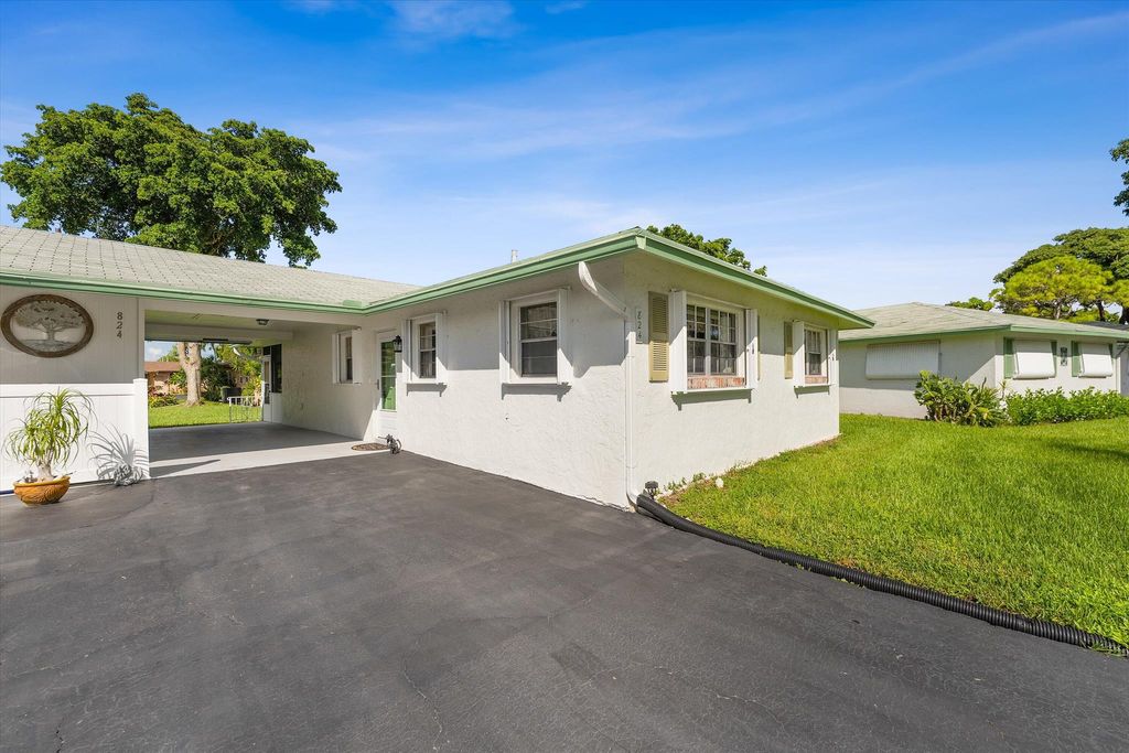 Photo of 824 Meadowlark Lane, Delray Beach, FL 33445 (MLS # R11024812)