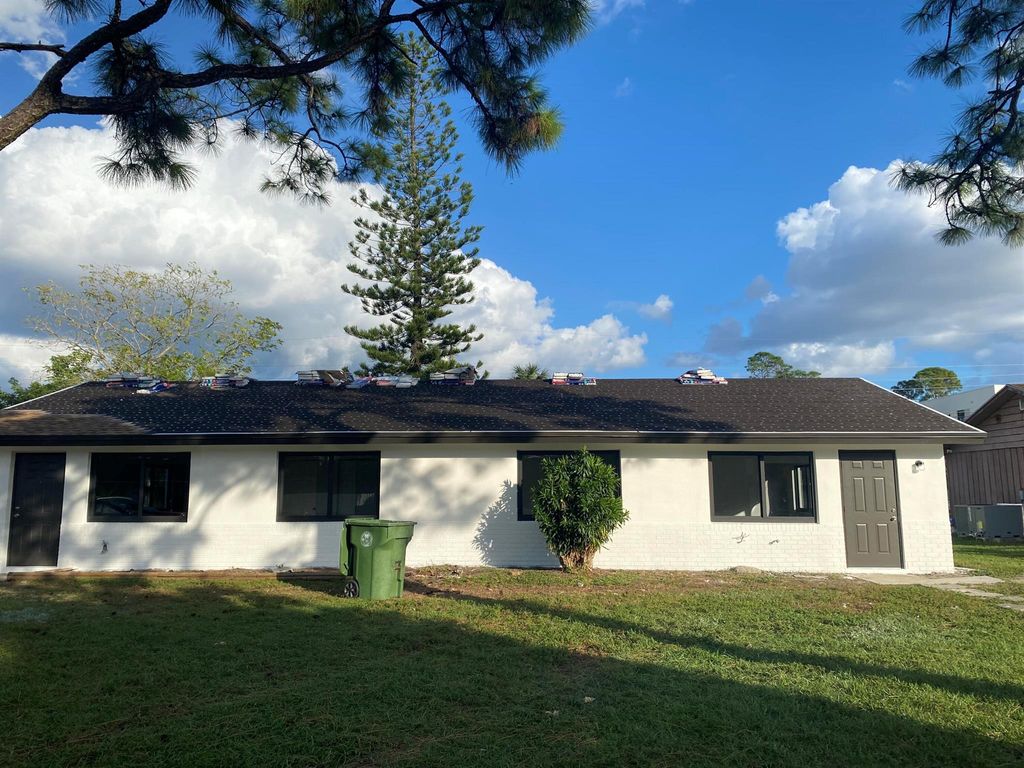 Photo of 3802 Patio Ct, Palm Springs, FL 33461 (MLS # R10942071)