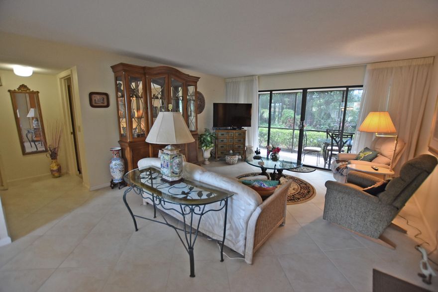 Residence full of potential! Great first floor residence located in the Kittiwake section of Quail Ridge Country Club.  Spacious home with two bedroom two full baths.Screened porch just off the living area is the perfect place to relax & enjoy your morning coffee from.Tile flooring throughout living area & entry. White painted kitchen cabinetry.  Large window let in plenty of natural lighting.  Master bedroom with walk-in closet, large vanity and step-in shower area, sliders to screened porch. Guest bedroom also has sliders to screened porch and two closets, plenty of storage area here. Utility room with washer/dryer just off the screened porch. Close to new Clubhouse, golf, tennis, fitness center and all amenities. This unit can become part of the guest rental program at Quail Ridge. Mandatory membership. Quail Ridge is a private, member-owned community and club. All residents are members of Quail Ridge Country Club and have a choice of either a golf or a social/tennis membership.