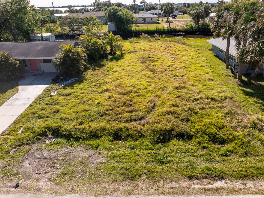Discover your perfect dream home with an exceptional canal-front cleared vacant lot in the desirable Suncoast community of Port Charlotte ready to build. This property offers 60 feet direct water frontage with access to the river and Charlotte Harbor, making it ideal for boating and fishing enthusiasts.  Available public water and sewer utilities, simplifying the building process.  NO HOA, NO CDD.  Located in a quiet area just minutes from local amenities, including the Port Charlotte Beach Park, Fishermen's Village, and the new Sunseeker Resort.  Conveniently located 1  minute from I-75 & 4 minutes from US-41.  Come see this rare and affordable slice of Florida's Gulf Coast, where you can tailored your ultimate waterfront dream home.
