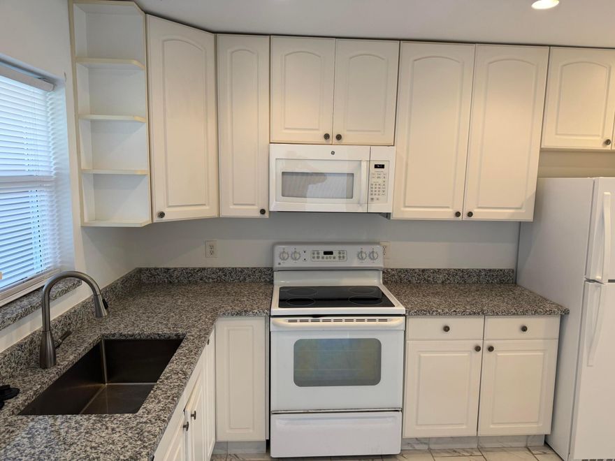 Spacious Corner unit Townhouse in Cresthaven 2 bedroom, 2 bath , walk-in closet in master, large family room and laundry/ utility room. Unit has been remodeled ,impact windows and doors, with 2 assigned parking spaces in front of the unit. 55 Plus community with clubhouse and pool. Affordable living in Palm Beach County centrally located south of Forrest Fill and Jog RD.  This a quite retiree community close to shopping , hospitals and all the Fla lifestyle  near by. Owner will consider annual lease $2150 per month.  Move -in requirement First and 2 months security deposit and HOA approval.  application fee $150 credit score 650 or better.  Unit is for sale or annual lease.  Annual lease available $2150 per month. First and 2 months Security deposit. This a 55 plus community requires application and HOA approval. Credit score 650 or better.