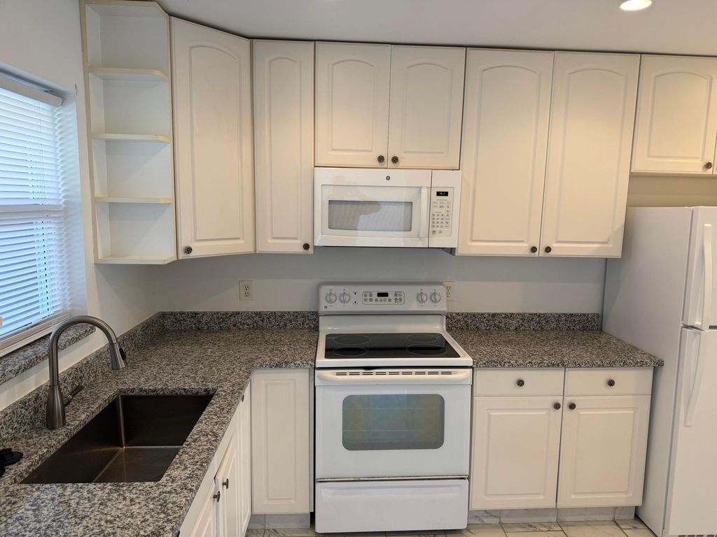 Photo of 5780 W Fernley Dr #103, West Palm Beach, FL 33415 (MLS # B26014550)