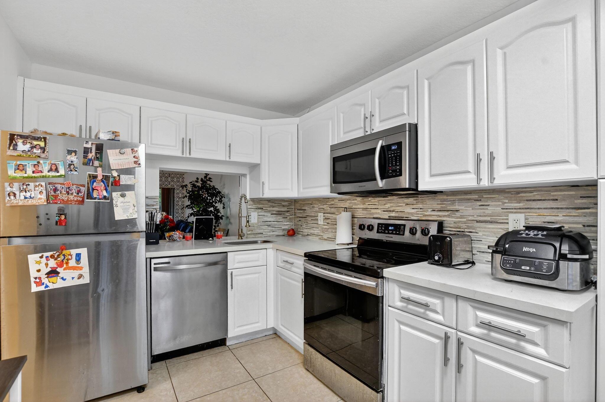 TARTAN COCONUT CREEK PHAS - Residential