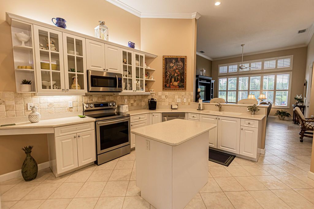 Photo of 569 SW Romora Bay, Port Saint Lucie, FL 34986 (MLS # R11017114)