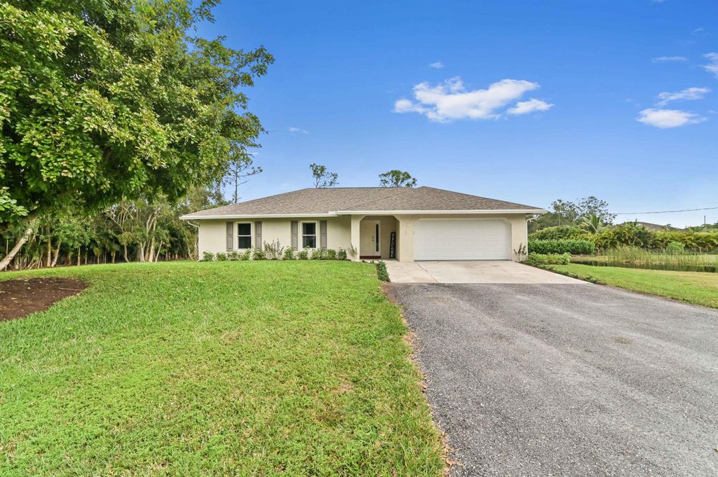 Photo of 14789 87th Street N, Loxahatchee, FL 33470 (MLS # R10954100)