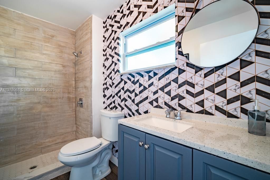 Photo of 722 SW 9th Street, Delray Beach, FL 33444 (MLS # B26004251)