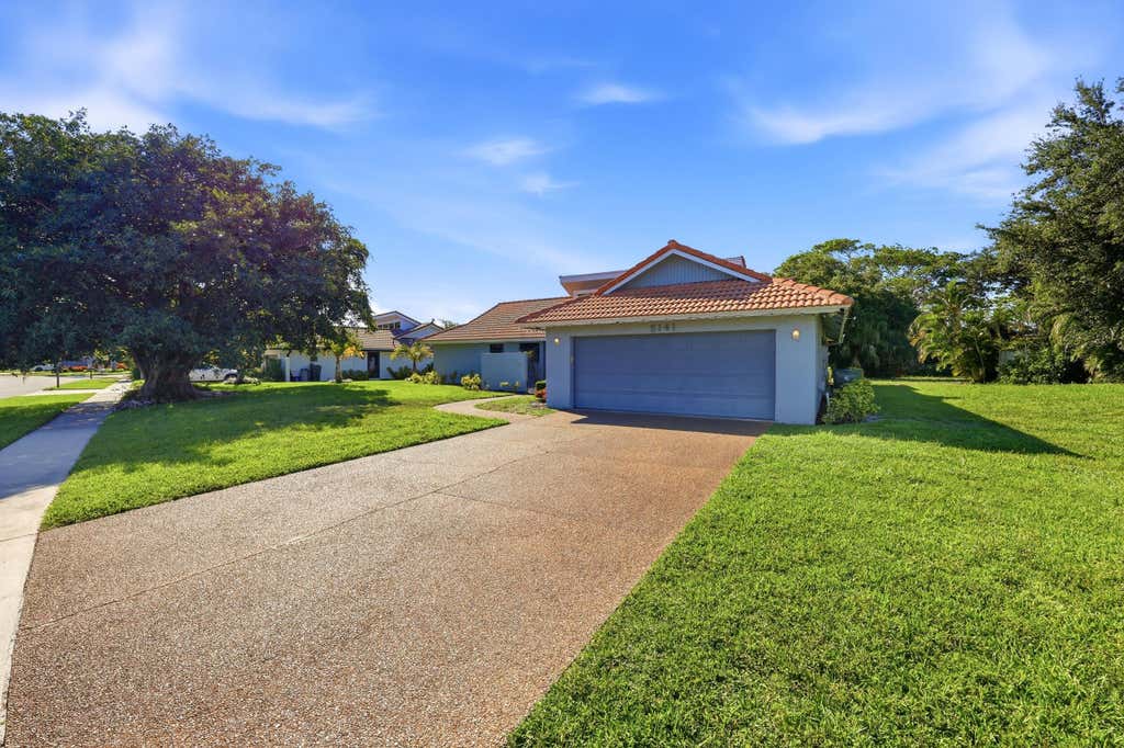 Photo of 5141 NW 3rd Terrace, Boca Raton, FL 33487 (MLS # B26040272)
