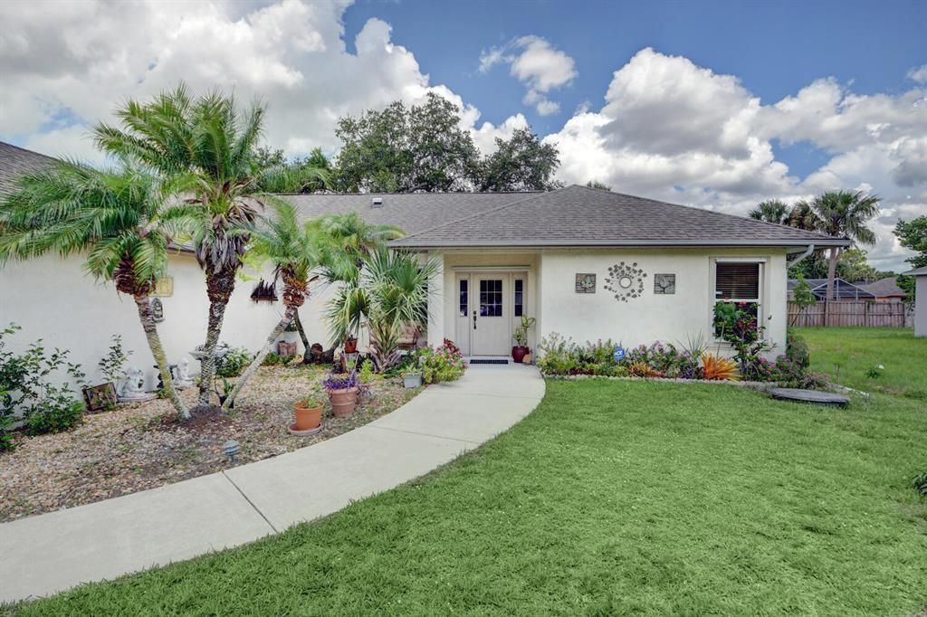 Photo of 2361 SW Pamona Street St, Port Saint Lucie, FL 34953 (MLS # R10806961)