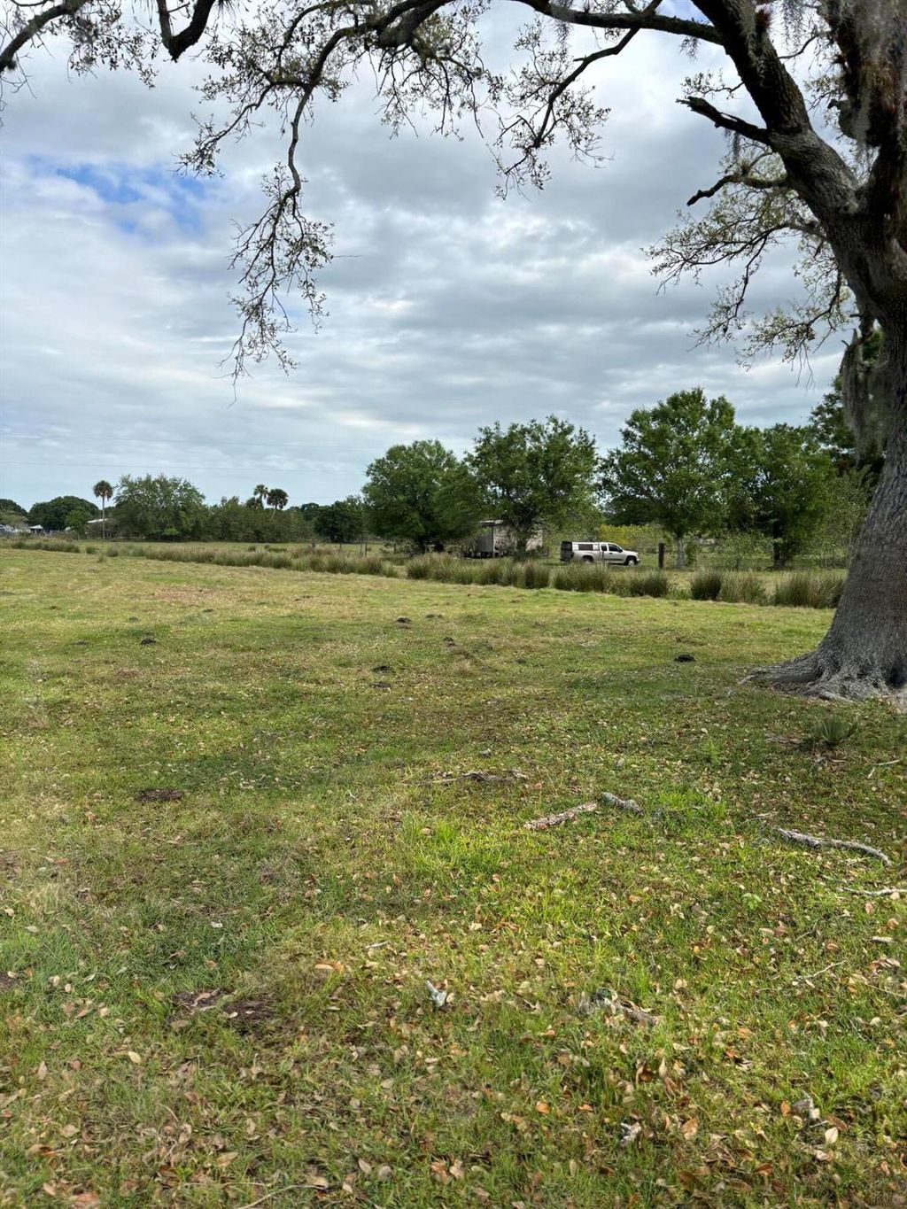 Photo of 998 E Coker Road, Fort Pierce, FL 34945 (MLS # R10971752)