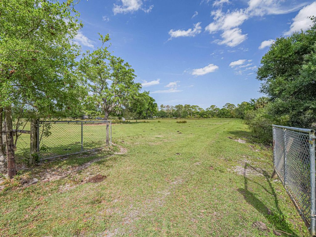 Photo of 998 E Coker Road, Fort Pierce, FL 34945 (MLS # R10971752)