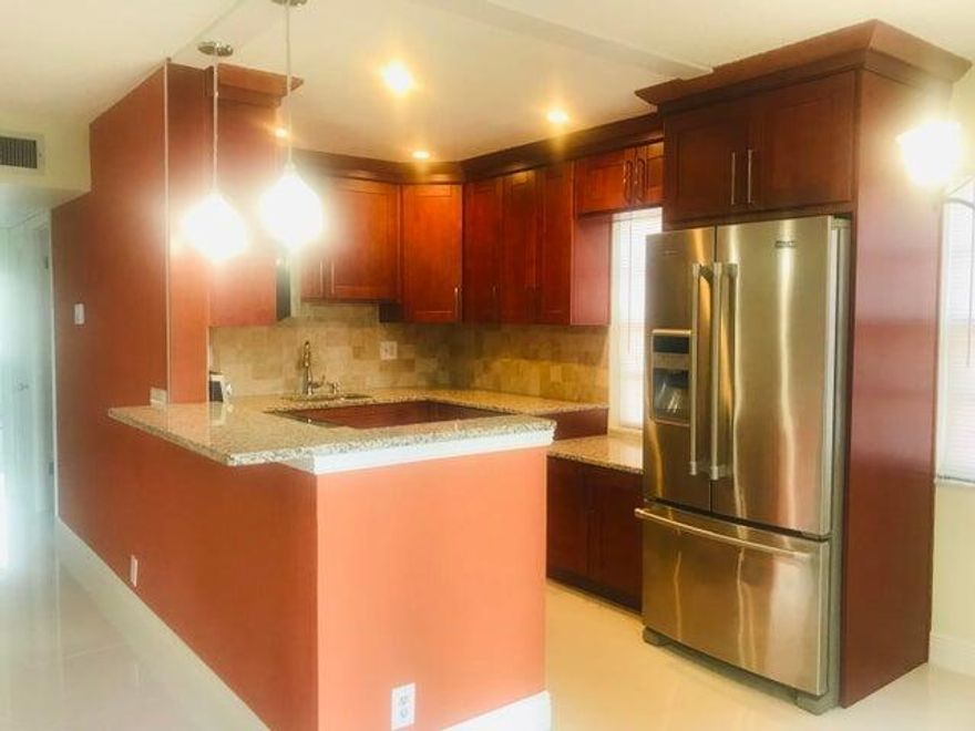 This is a wonderful 2nd floor unit totally redone with a garden view.  There is a lift in bldg.  Newly painted and shows like a model.  New kitchen, baths etc.  washer/dryer in closet.Custom tile and walls. Kings Point is a 55 plus resort style community with 3 multi-million dollar clubhouses - tennis courts - 6 heated pools - indoor resistance & lap pools - free movies - two golf courses - theatre with weekly entertainment - Bistro & cafe on site - beauty shop on site - library - workout rooms-card rooms - and much more.  Even courtesy buses to shopping daily.  Just six miles from the ocean & historic downtown Delray Beach.  Bldg does require minimum 700 credit score for every occupant....