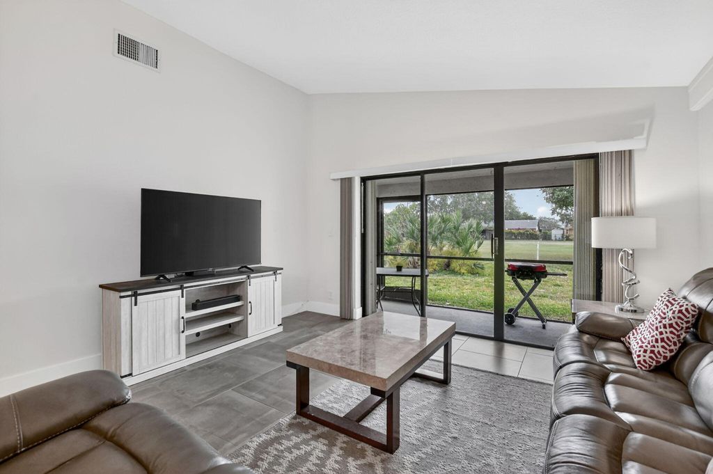 Photo of 3693 Arelia Drive N, Delray Beach, FL 33445 (MLS # B26017931)