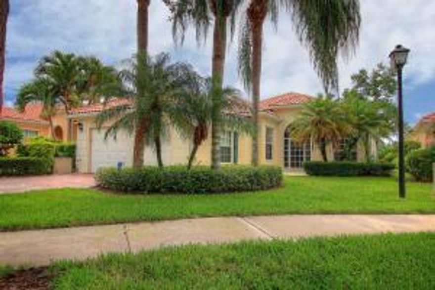 Light and Bright three bedroom plus den Divosta-built Oakmont w/ extended great room.  Enjoy a double lake view from your peaceful lanai. Great location on  a quiet street, and away from the train.  This lovely home has accordion shutters, corian counters, plantation shutters,awning on the patio, central vaccuum, wide lake view and much more.