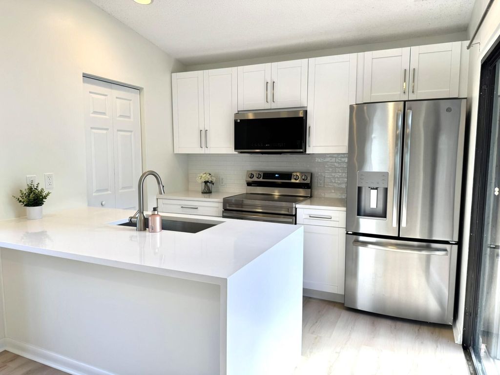 Photo of 22374 Pineapple Walk Drive, Boca Raton, FL 33433 (MLS # R11051517)