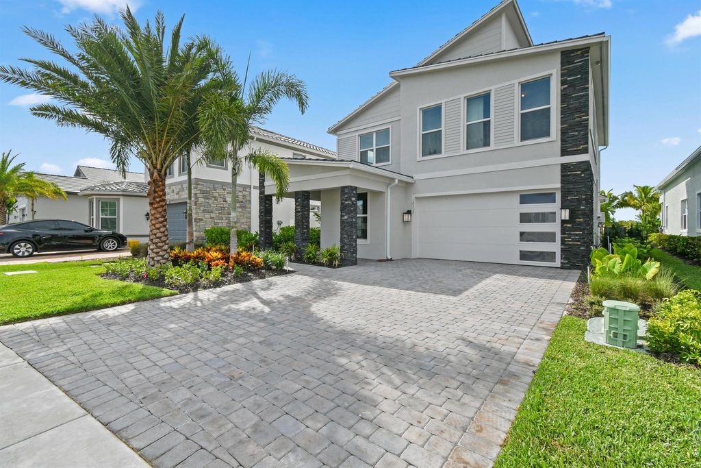 Photo of 12313 Frontline Lane #Riverwalk, Palm Beach Gardens, FL 33412 (MLS # R11064952)