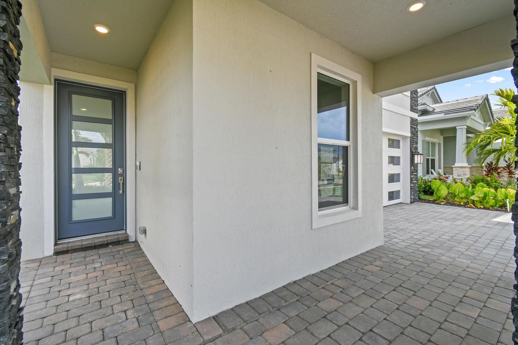 Photo of 12313 Frontline Lane #Riverwalk, Palm Beach Gardens, FL 33412 (MLS # R11064952)