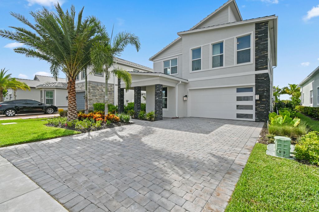 Photo of 12313 Frontline Lane #Riverwalk, Palm Beach Gardens, FL 33412 (MLS # R11064952)