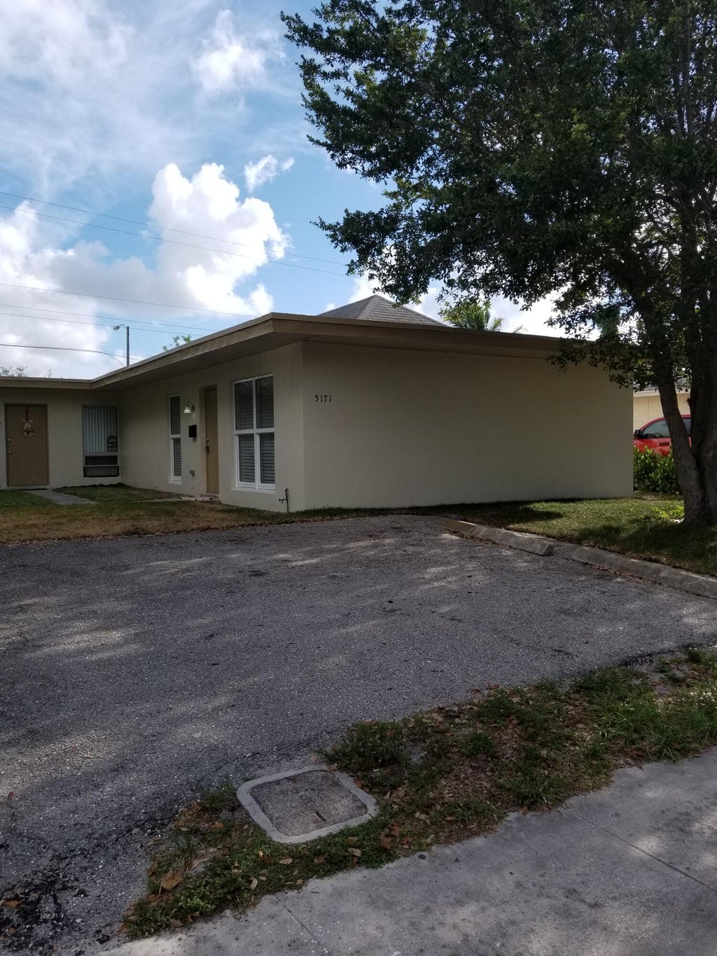 Photo of 5171 EADIE Place, West Palm Beach, FL 33407 (MLS # B26088160)