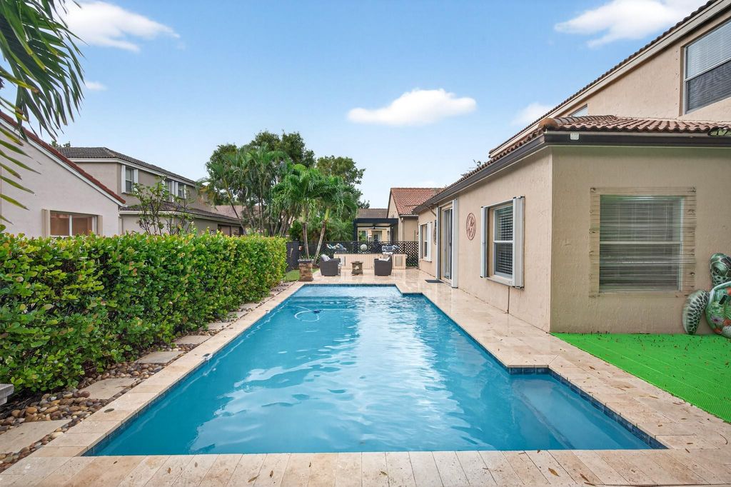 Photo of 5784 NW 49th Ln, Coconut Creek, FL 33073 (MLS # F10539906)