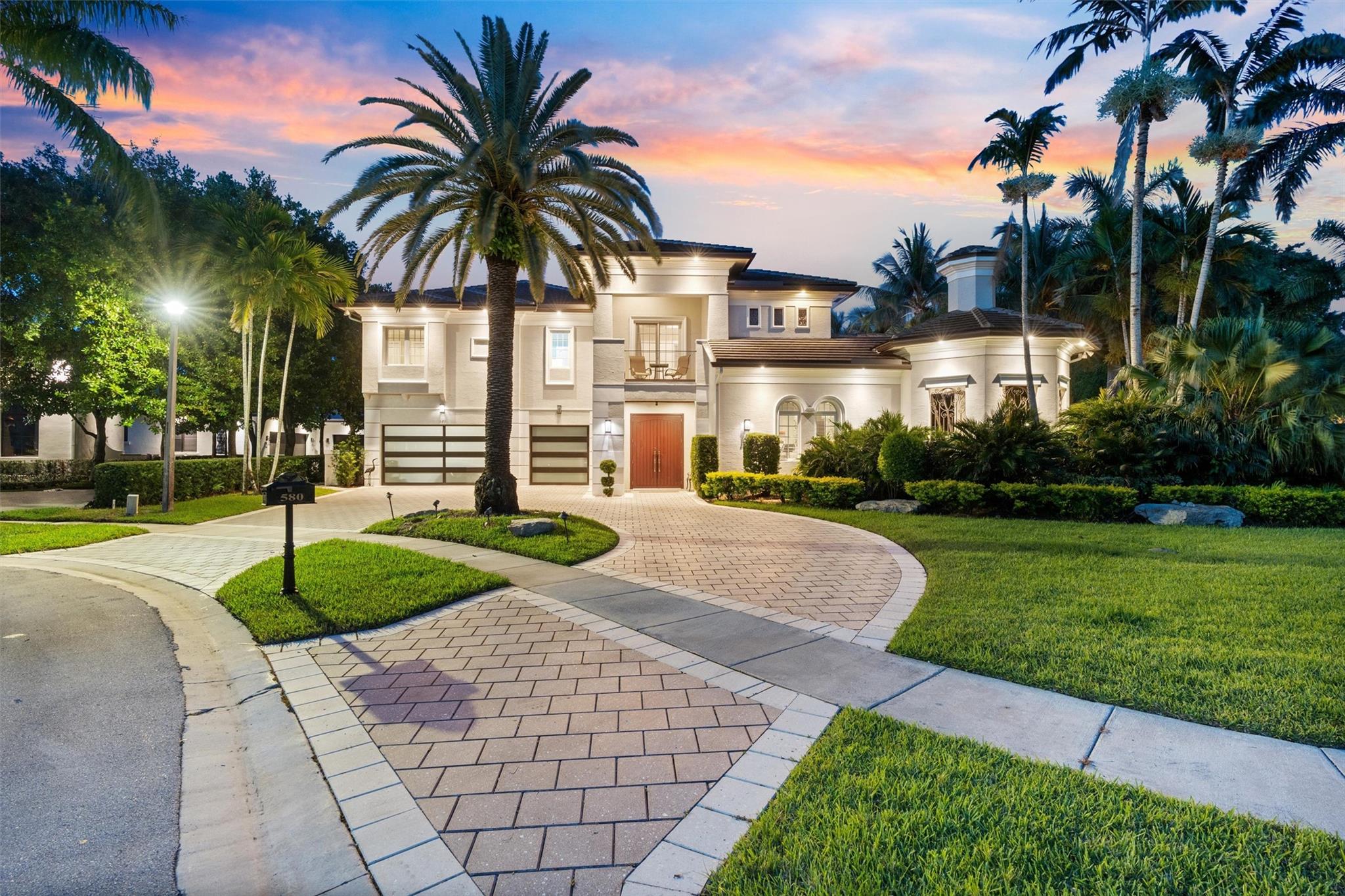 WELCOME TO THIS EXTRAORDINARY CUSTOM COURTYARD HOME LOCATED IN THE COVETED INNER CIRCLE OF PRESTIGIOUS HAWKS LANDING! METICULOUSLY RENOVATED WITH ITS TOP-TIER UPGRADES, THIS ESTATE HAS IT ALL* THE 1ST FLOOR FEATURES A GRAND PRIMARY SUITE WITH HIS/HERS BATHS, AN ADJACENT PRIVATE OFFICE + GUEST HOUSE AND 4 SPACIOUS ENSUITE BEDROOMS AND A VERSATILE LOFT AWAIT UPSTAIRS* DESIGNED FOR SEAMLESS INDOOR-OUTDOOR LIVING, SHOWCASING AN OVERSIZED COURTYARD WITH A SPECTACULAR HEATED POOL AND SPA, AND OUTDOOR SUMMER KITCHEN, MAKE THIS AN ENTERTAINER'S DELIGHT* EVERY DETAIL HAS BEEN THOUGHTFULLY CURATED-FROM DESIGNER FINISHES AND IMPACT GLASS TO A FULL-HOUSE GENERATOR FOR PEACE OF MIND* THIS IS MORE THAN A HOME—IT’S A STATEMENT OF LUXURY AND WORDS CAN’T CAPTURE ITS BEAUTY* YOU MUST SEE IT TO BELIEVE IT!!!