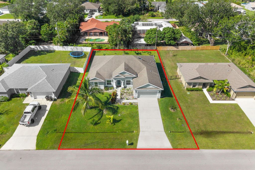 Photo of 2018 SW Beard Street, Port Saint Lucie, FL 34953 (MLS # R11137333)