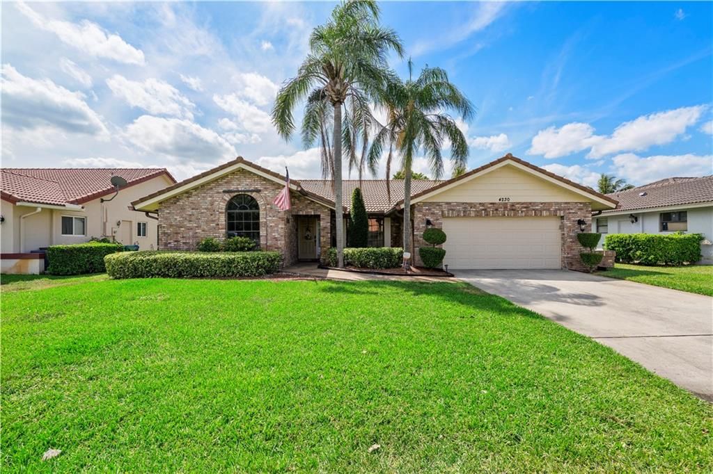 Photo of 4230 NW 73rd Way, Coral Springs, FL 33065 (MLS # F10279163)