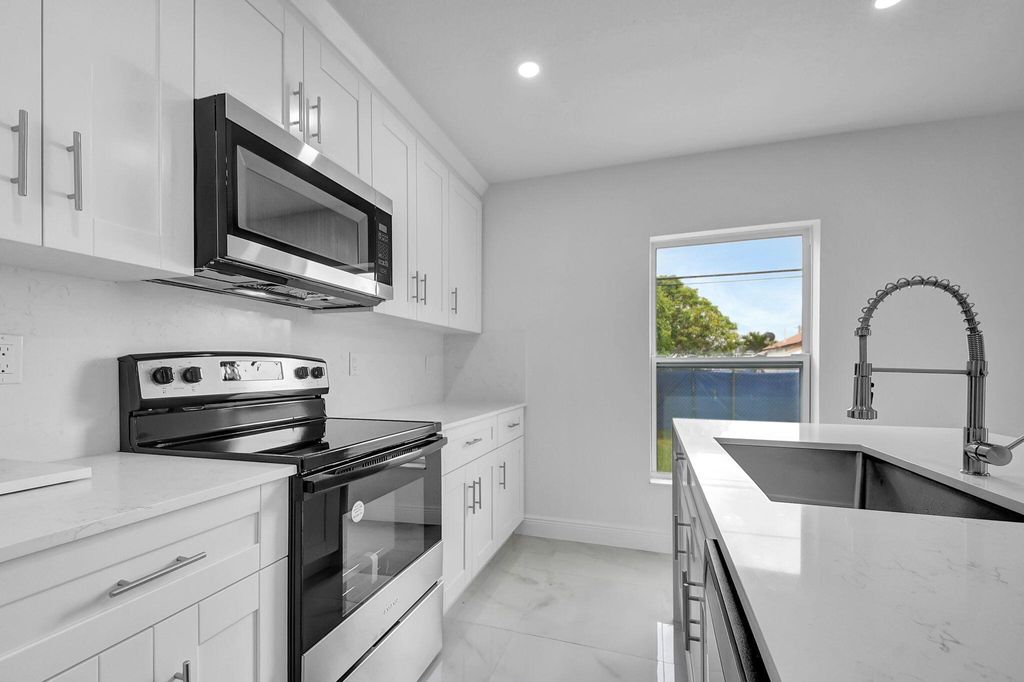 Photo of 4468 Clinton Boulevard, Lake Worth, FL 33461 (MLS # R11064466)