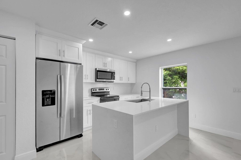 Photo of 4468 Clinton Boulevard, Lake Worth, FL 33461 (MLS # R11064466)