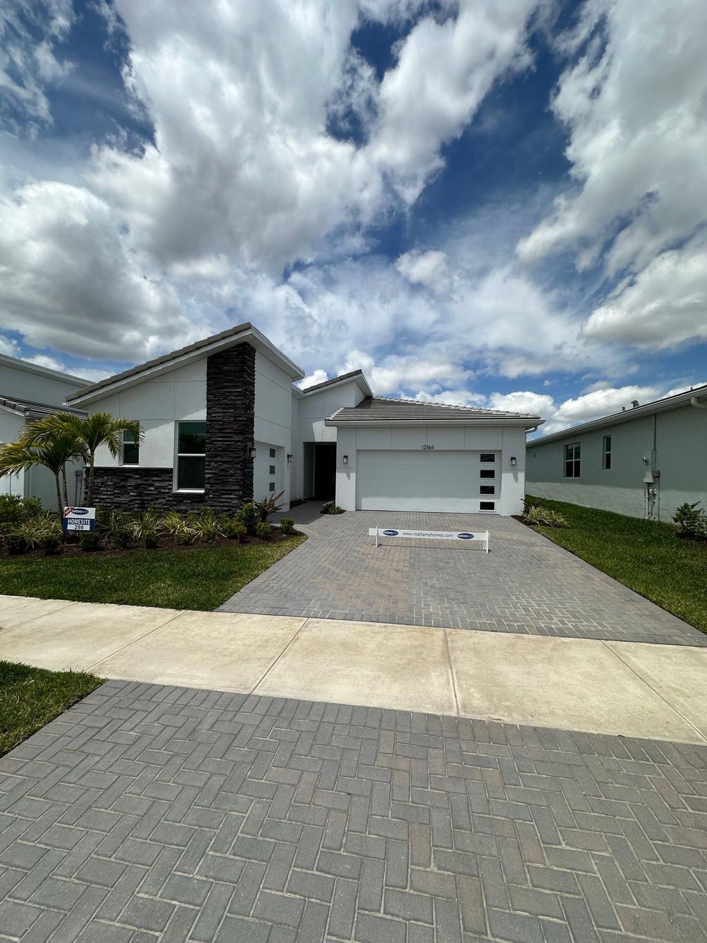 Photo of 12166 Viridian Boulevard, Port Saint Lucie, FL 34987 (MLS # R10979243)