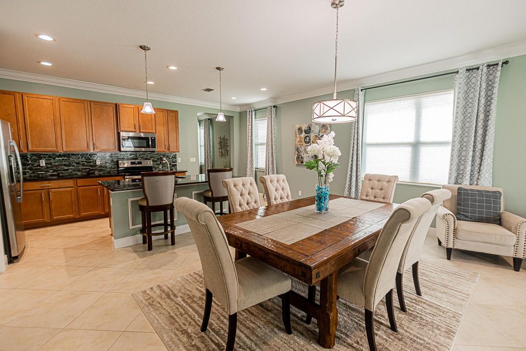Photo of 252 SE Via Visconti, Port Saint Lucie, FL 34952 (MLS # R11121499)