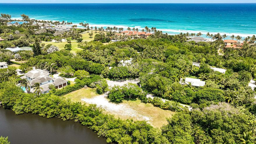 Seize this rare opportunity to build your dream home just steps from private beach access in the coveted Seminole Landing neighborhood. Situated on one of the nicest streets in the community, this property boasts 1.47 acres and is positioned directly on a dreamy tidal pond. The neighborhood has private security and tennis courts. Perfectly situated between the best schools, malls, and restaurants in the area. This is not a property to miss!