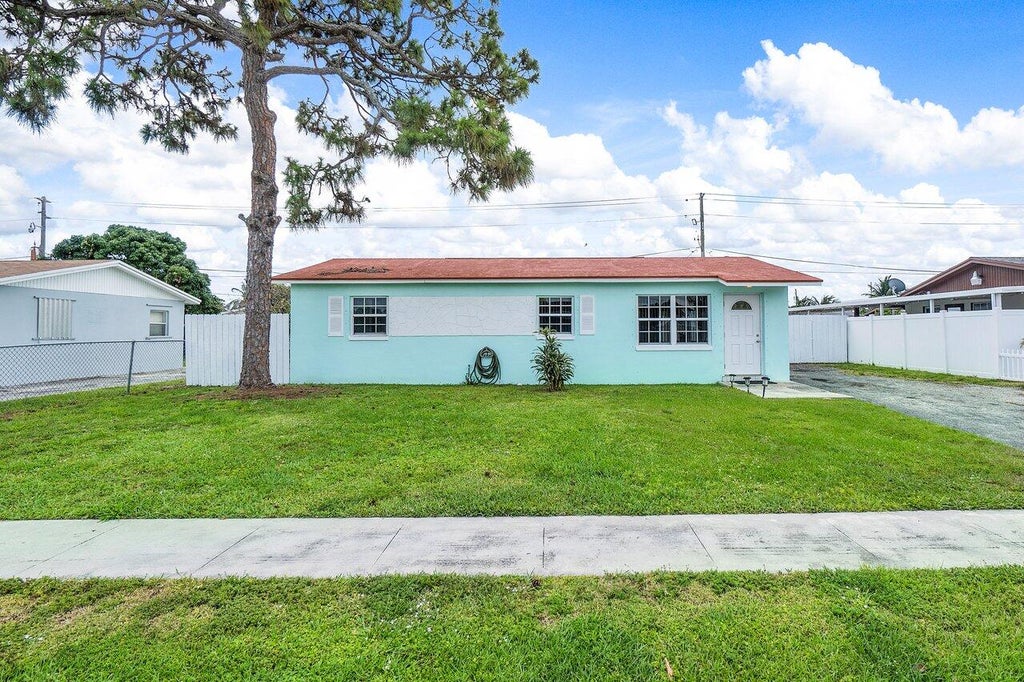 Photo of 4946 Springfield Drive, West Palm Beach, FL 33415 (MLS # R10797250)
