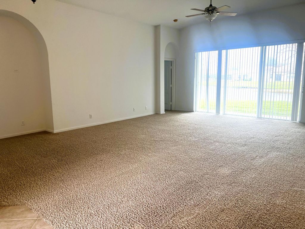 Photo of 5606 Place Lake Drive, Fort Pierce, FL 34951 (MLS # R11169417)