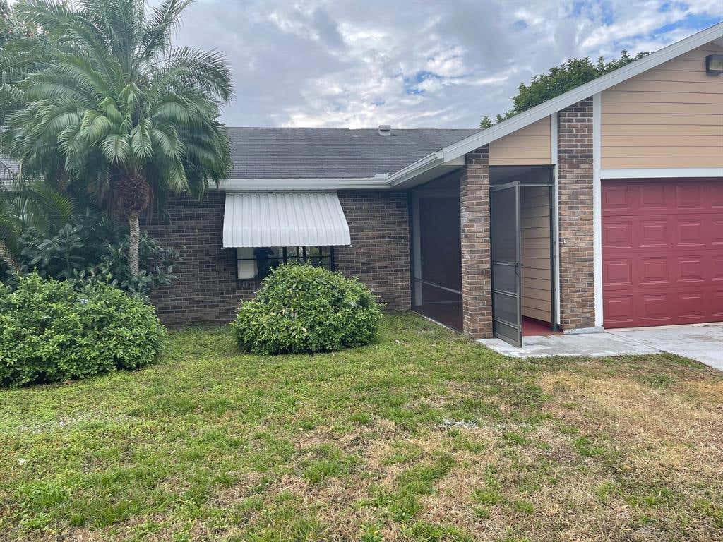 Photo of 2066 SW Castinet Lane, Port Saint Lucie, FL 34953 (MLS # R10776875)