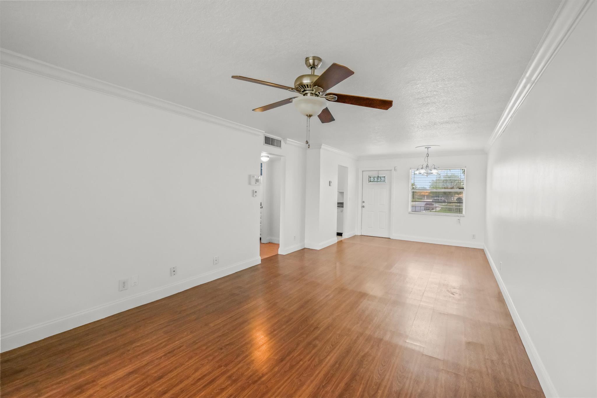 Welcome to your cozy Boca Raton rental! This unit features beautiful wood floors in the living area and comfy carpet in the bedroom. Relax on the spacious covered balcony, perfect for enjoying the Florida weather. With easy access to shops, restaurants, and major highways, everything you need is close by. Plus, the unit is located in an A+ school district, making it ideal for families. Don't miss out on this convenient and comfortable living space.