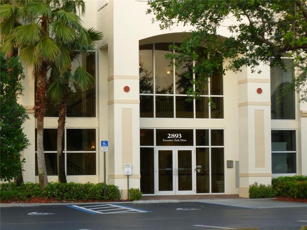 Photo of 2893 Executive Park Drive #106, Weston, FL (MLS # B26054619)