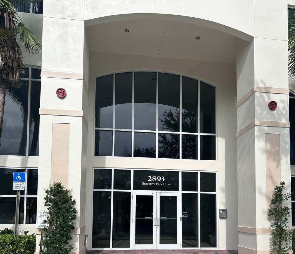 Photo of 2893 Executive Park Drive #106, Weston, FL (MLS # B26054619)